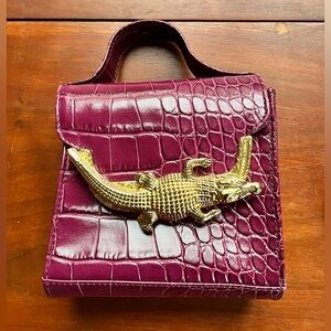 Crocodile Embossed Burgundy Handbag with Gold Accent by Fabienne Chapot